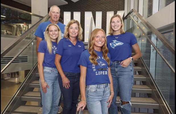 Ron and Jodi Rauert are pictured with their daughters Jessica, Jenna and Jocelyn inside the student union at UNK. (—photo by Erika Pritchard, UNK Communications)