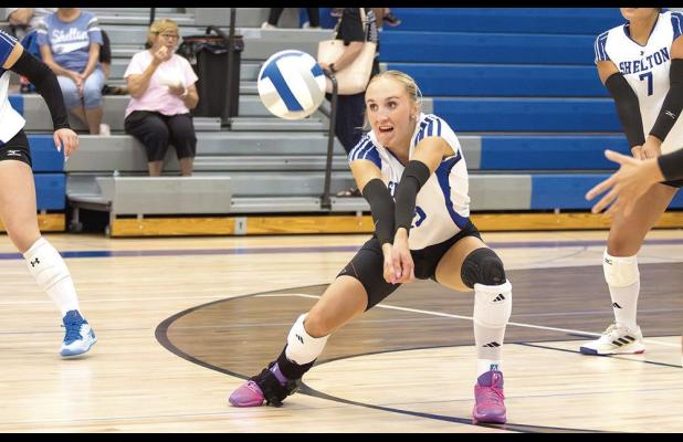 Olivia Kennedy eyes a dig during the season opening home match against Nebraska Christian last Thursday night. (—photo by Jeanette Branson)