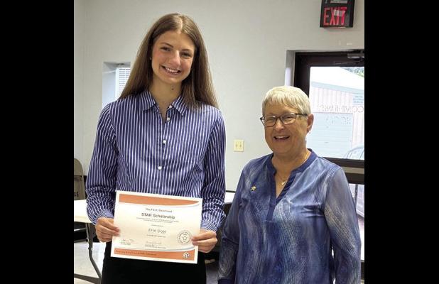 P.E.O. Chapter BI Star Scholarship Chair Cheryl Woodman (right) presents Erin Gegg the $2,500 STAR Scholarship from the P.E.O. Sisterhood. (—courtesy photo)