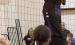 Gibbon’s Cove Fries goes up for a block in recent Lady Buffalo volleyball action. (—photo by Alissa Baxter)