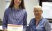 P.E.O. Chapter BI Star Scholarship Chair Cheryl Woodman (right) presents Erin Gegg the $2,500 STAR Scholarship from the P.E.O. Sisterhood. (—courtesy photo)