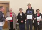 Aaron Bly (far left) and Christian Bly (second from right), representing the Shelton Youth Group and Kids and Dreams Foundation, accepted a “Youth Caregiver” award and a check to sponsor a youth group volunteer for a Kids and Dreams camp this summer f Auxiliary awards Methodist Church Youth Group with “Youth Caregiver Award,” donates to Kids and Dreams