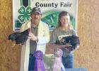 Mason Janda (pictured here with judge Larry Rauert) had a great day in the FFA poultry show earning Champion Poultry Showman, as well as Grand and Reserve Champion Poultry. Article Image Alt Text