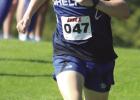 The conference cross country race used the top three team finishers for the team scores. The Bulldogs’ third runner, Kameron Taylor pictured above, earned the title for Shelton by cutting over a minute off of his best time to place eighth overall, secur