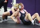 Freshman Briggs Doane contains his opponent while competing in recent Eagles wrestling action. (—photo by Doug Kuskie)