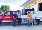 Black Hills Energy representative Stephanie King presents a check for $1,000 to members of the Shelton Volunteer Fire Department recently as recipients of funds from the Black Hills Energy Funds for Firefighters program. The submitted grant application sa