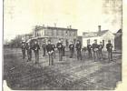 John S. Hedges and D. P. Junk arrived in the village of Shelton in the late 1800s and established a small business just north of the Union Pacific railroad tracks, Hedges &amp; Junk Grain, Lumber and Coal seen behind the soldiers in this undated Clipper a