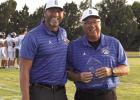 Shelton head football coach Mike Lowe (at left) presented assistant coach Ed Lowe a plaque for his 45 yeas of coaching. Ed has roamed the sidelines at Johnson-Brock, Ewing, Broken Bow and at Shelton during his nearly half a century of coaching. He has bee