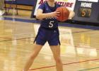 Emma Clark gets ready to pass the ball in recent Lady Buffalo basketball action. (—photo by Steve Glenn) Emma Clark gets ready to pass the ball in recent Lady Buffalo basketball action. (—photo by Steve Glenn)