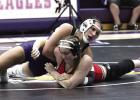 Savannah Pietrzak is on her way to a pin in the Lady Eagles’ dual win over Aurora last Thursday night. (—photo by Steve Glenn) Savannah Pietrzak is on her way to a pin in the Lady Eagles’ dual win over Aurora last Thursday night. (—photo by Steve Glenn)