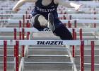 Shelton senior Addison Burr ran and leaped her way to first place in the 100 meter hurdles at the Sutton Invite. Her win was the lone gold medal for the Lady Bulldogs. (—photo by Jeanette Branson) Article Image Alt Text