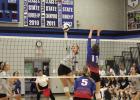 Bulldog hitter Sidney Gegg directs a spike past a High Plains blocker in Shelton’s three set win to advance to the state tournament. (—photo by Brooke Bly) Lady Bulldogs punch their ticket to state