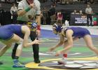 Ila Jurgens works for a takedown during one of her state tournament matches last week. Ila is the first Gibbon girl wrestler to earn a medal at the state tournament, taking fourth place in the 105 pound division of Class B. Ila Jurgens works for a takedown during one of her state tournament matches last week. Ila is the first Gibbon girl wrestler to earn a medal at the state tournament, taking fourth place in the 105 pound division of Class B.