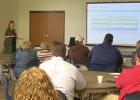 South Central Economic Development District presenter Lori Ferguson explains results from the recent Wood River needs assessment survey. (—photo by Steve Glenn) Wood River survey results shared