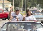 Parade Grand Marshals Ron and Esther Rickert helped lead the parade with big smiles and waves.