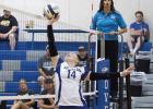 Setter Brooklynn Pearson tips the ball during action at the Overton Tournament on Saturday. (—photo by Jeanette Branson)
