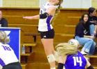 Reese Blauhorn goes high for a kill attempt. (—photo by Andrea Johnson)