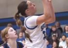 Macy Willis gets a rebound and layup against Arapahoe. (—photo by Jeanette Branson) Macy Willis gets a rebound and layup against Arapahoe. (—photo by Jeanette Branson)