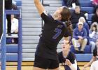 Senior Piper Gonzalez tips the ball over the net during Lady Buffalo volleyball action last week against Sandy Creek. (—photo by Alissa Baxter)