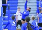 Kassandra Trevino (#16) sends the ball across the net in action against Hastings St. Cecilia last week on the court in Gibbon, assisted by Piper Gonzales (#4), Claire Clark (#14) and Cove Fries. (–photo by Dennis Walker) Article Image Alt Text