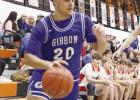 Gibbon junior Tanner Nietfeld tries to drive the baseline in the game against Giltner/Harvard last week. (—courtesy photo) Gibbon junior Tanner Nietfeld tries to drive the baseline in the game against Giltner/Harvard last week. (—courtesy photo)
