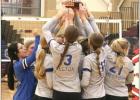 The winning Shelton Bulldog volleyball teams hoists the third place trophy at the conclusion of their four set win over Humphrey St. Francis last Saturday. (—photo by Barb Berglund) Shelton volleyball claims bronze