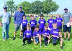 Purple third and fourth grade Wood River flag football team Front row, left to right, Brexton Hayes, James Allen, Boone Wissing, and Matthew Rotter; and back row, coaches Brady Blauhorn and Colby Hayes, Joseph Dubbs, Grayson Gideon, Eric Matias, Ty Blauho Article Image Alt Text