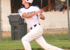 Aiden Graves watches as a long fly ball leaves his bat. The flyball, an out, was hit long enough to allow Easton Graves to tag up and score from second base in the game with Ord. (—photo by Lynn McBride) Article Image Alt Text