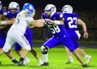 Senior lineman sets up blocking protection against St. Paul in last Friday night’s contest. (—photo by Andrea Johnson)