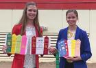 Buffalo County 4-Hers Jaylea (left) and Justine Pope earned several team and individual ribbons at The Premier Animal Science Event held on the East Campus of the University of Nebraska-Lincoln recently. (—courtesy photo) Article Image Alt Text