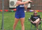 MaKenna Willis winds up for a throw in the discus at the district meet last Thursday. Willis earned a trip to state competition by placing third in the shot put. (–photo by Barb Berglund) Bulldogs ready to storm state championships after district meet