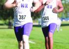 Dakota Green and Byron Guerrero Trejo follow the dash line at the recent Ord Invite. (—photo by Doug Kuskie) Article Image Alt Text