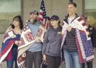 Quilts of Valor quilt maker Cindy Zurn joined quilt recipients for a photo at a recent presentation ceremony in Alliance. Pictured are, left to right, Marissa Robinson, Brandon Robinson, Cindy Zurn, and Ryan Robinson. (–courtesy photo) Quilts of Valor quilt maker Cindy Zurn joined quilt recipients for a photo at a recent presentation ceremony in Alliance. Pictured are, left to right, Marissa Robinson, Brandon Robinson, Cindy Zurn, and Ryan Robinson. (–courtesy photo)