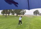 Anahi Tamayo winds up for a shot at the wet and soggy LouPlatte Conference meet held at Indianhead Golf Course in Grand Island. (–courtesy photo)