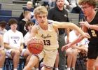 Freshman Jace Stewart gets past a Thayer Central defender for a layup attempt in last week’s subdistrict contest. (—photo by Doug Kuskie) Freshman Jace Stewart gets past a Thayer Central defender for a layup attempt in last week’s subdistrict contest. (—photo by Doug Kuskie)