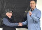 City of Gibbon Mayor Derrick Clevenger, at right, presented Lee Vohland with the key to the city at Lee’s retirement celebration from the Gibbon Volunteer Fire and Rescue Department on Sunday afternoon at the fire hall. (—photo by Steve Glenn) City of Gibbon Mayor Derrick Clevenger, at right, presented Lee Vohland with the key to the city at Lee’s retirement celebration from the Gibbon Volunteer Fire and Rescue Department on Sunday afternoon at the fire hall. (—photo by Steve Glenn)