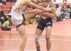 Wood River 152 pounder Dylan Ancheta (right) gets ready to take his opponent to the mat during action at the Arcadia/Loup City Duals Tournament last Friday. (—photo by Amber Price) Eagle grapplers compete hard at Arcadia/Loup City Duals