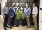 Governor Jim Pillen (second from left) poses with Gibbon community leaders Mayor Derrick Clevenger (far left), city administrator Matt Smallcomb (second from right), and councilmember Brandon Brueggemann (far right) at the water infrastructure improvement