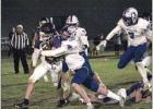 The Bulldog defense swarms to the SEM ball carrier during Friday night’s playoff game at Sumner. (—photo by Jose Lopez) Bulldog season ends in playoff game with SEM