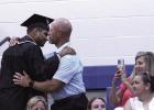 Family, friends and mentors were honored by the class of 2026 with a flower and embrace during the Gibbon graduation ceremony. (—photo by Steve Glenn)