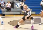 Olivia Kennedy eyes a dig during the season opening home match against Nebraska Christian last Thursday night. (—photo by Jeanette Branson)