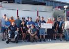 Stephanie King, representing Black Hills Energy, presents a check for $2,000 to members of the Gibbon Volunteer Fire Department as part of the Black Hills’ Funds for Firefighters program. According to the grant application, “The Gibbon Fire Department