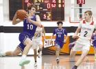 Keaton Heikkinen streaks towards the basket against Giltner/Harvard during Saturday’s contest against the Hornets. (—courtesy photo) Keaton Heikkinen streaks towards the basket against Giltner/Harvard during Saturday’s contest against the Hornets. (—courtesy photo)