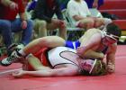Buffalo Kreyton Rockefeller bends back an opponent while competing for the Buffaloes at 170 pounds. (–photo by Lynsey Weekley) Article Image Alt Text