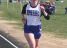 Gibbon’s Lindsay Wilkens and the Gibbon boys and girls track and field teams will be at the Minden Invitational on Friday and will host their own invitational on Thursday, April 22. (–photo by Lynn McBride) Gibbon track and field teams compete at windy Adams Central