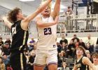 Beau Rohrich gets to the basket for two points in the Eagles’ subdistrict game against Thayer Central. (—photo by Doug Kuskie) Beau Rohrich gets to the basket for two points in the Eagles’ subdistrict game against Thayer Central. (—photo by Doug Kuskie)