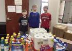 Left to right, Eli Gartner, Owen Piper, and Luke Clevenger recently completed a STEM project “Bingo for Bucks,” to purchase cleaning supplies for Crossroads Mission. (–courtesy photo)