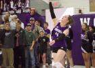 Senior defensive specialist Lila Morse shows off her jump serve during recent Lady Eagle volleyball action. (—photo by Andrea Johnson)