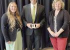 Wood River High FFA advisor Kiley Codner (left) and assistant FFA advisor Christy Burnett (right) flank Wood River Superintendent Terry Zessin at the State FFA Convention where Mr. Zessin was a recipient of the Cornerstone Award. (–courtesy photo)