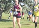 Centura’s sole girl runner Lonna Patrick keeps a steady pace on the Ravenna course. (—photo by Amber Price) Article Image Alt Text
